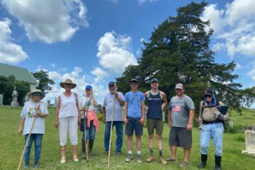 Group photo of attendees at the Keokuk county prairie cemeteries field trip